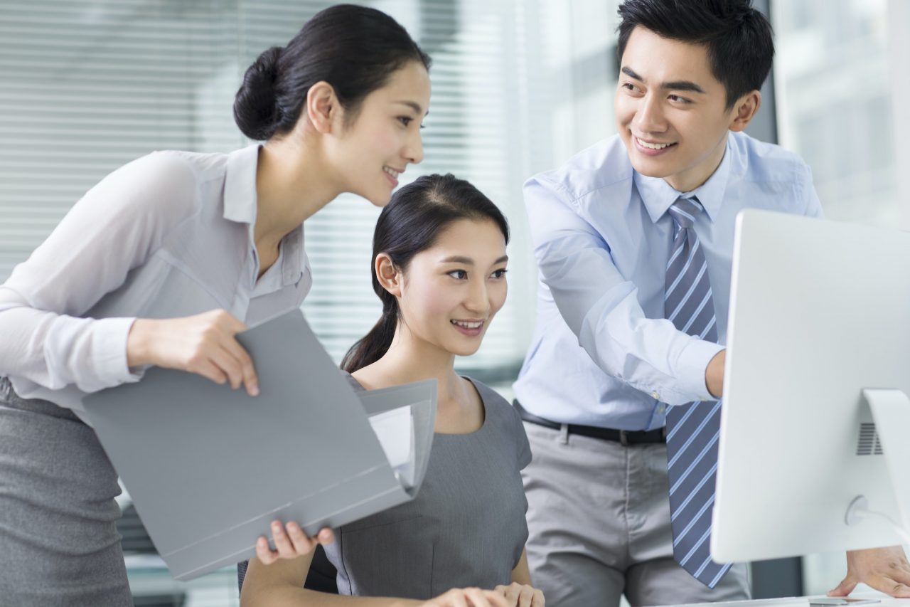 AmeriTax team reviewing a client's documents together
